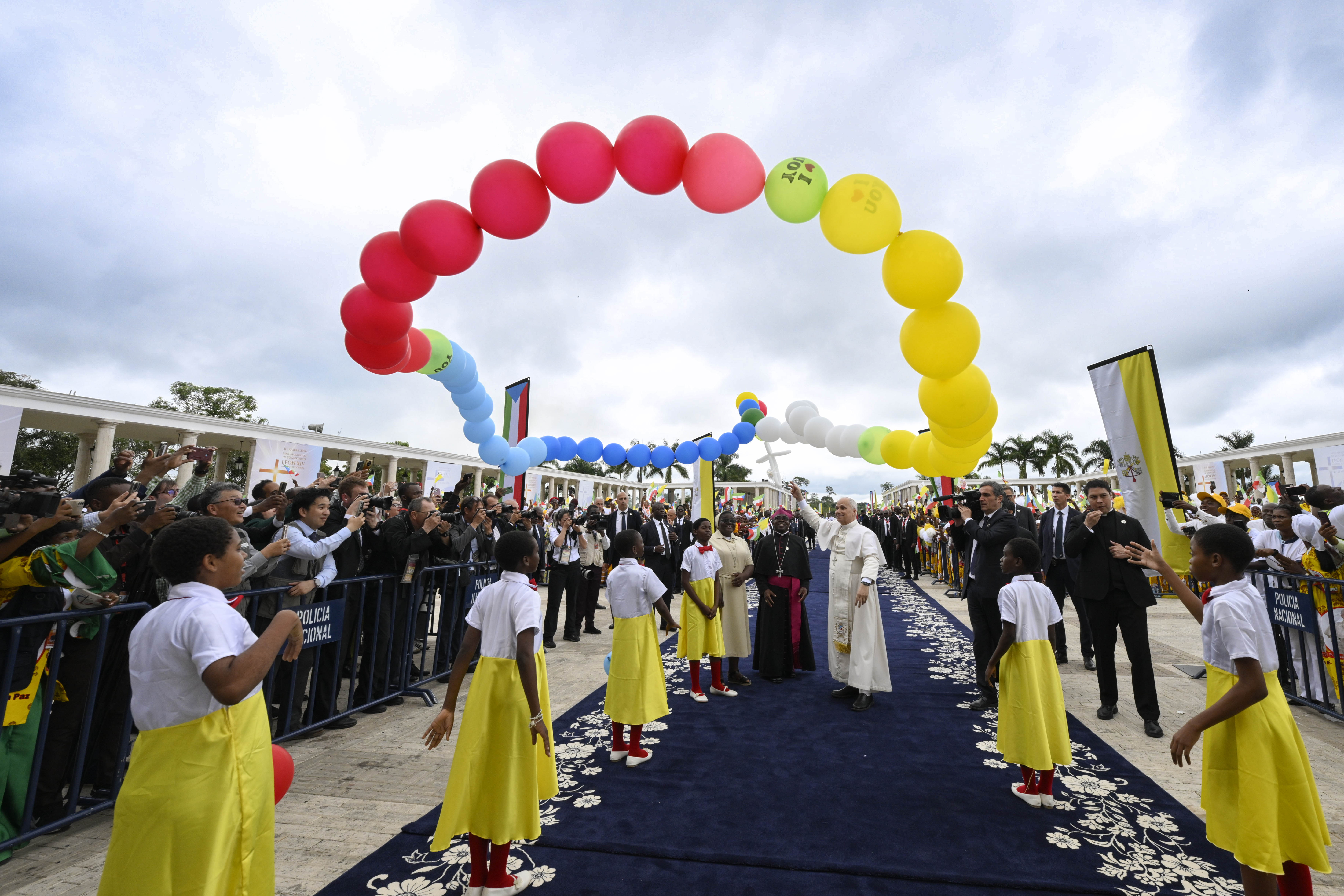Pope Leo XIV along with children releases balloons in the shape of a rosary into the sky outside the Basilica of the Immaculate Conception in Mengomeyén, Equatorial Guinea, on Wednesday, April 22, 2026. | Credit: Vatican Media