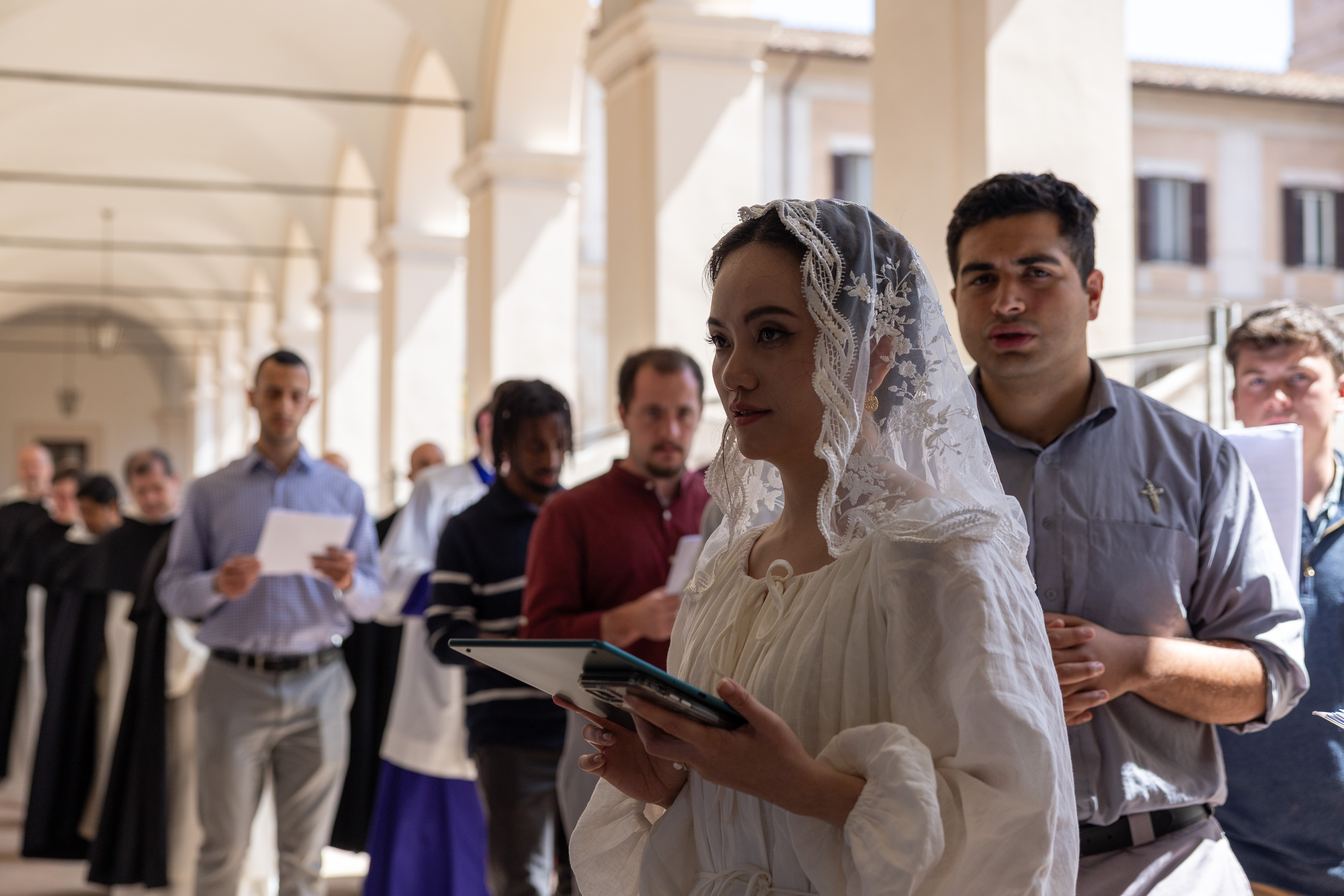 Students of the Pontifical University of St. Thomas Aquinas in Rome participate in a Eucharistic procession on the university’s campus on April 16, 2026. | Credit: Daniel Ibanez/EWTN News