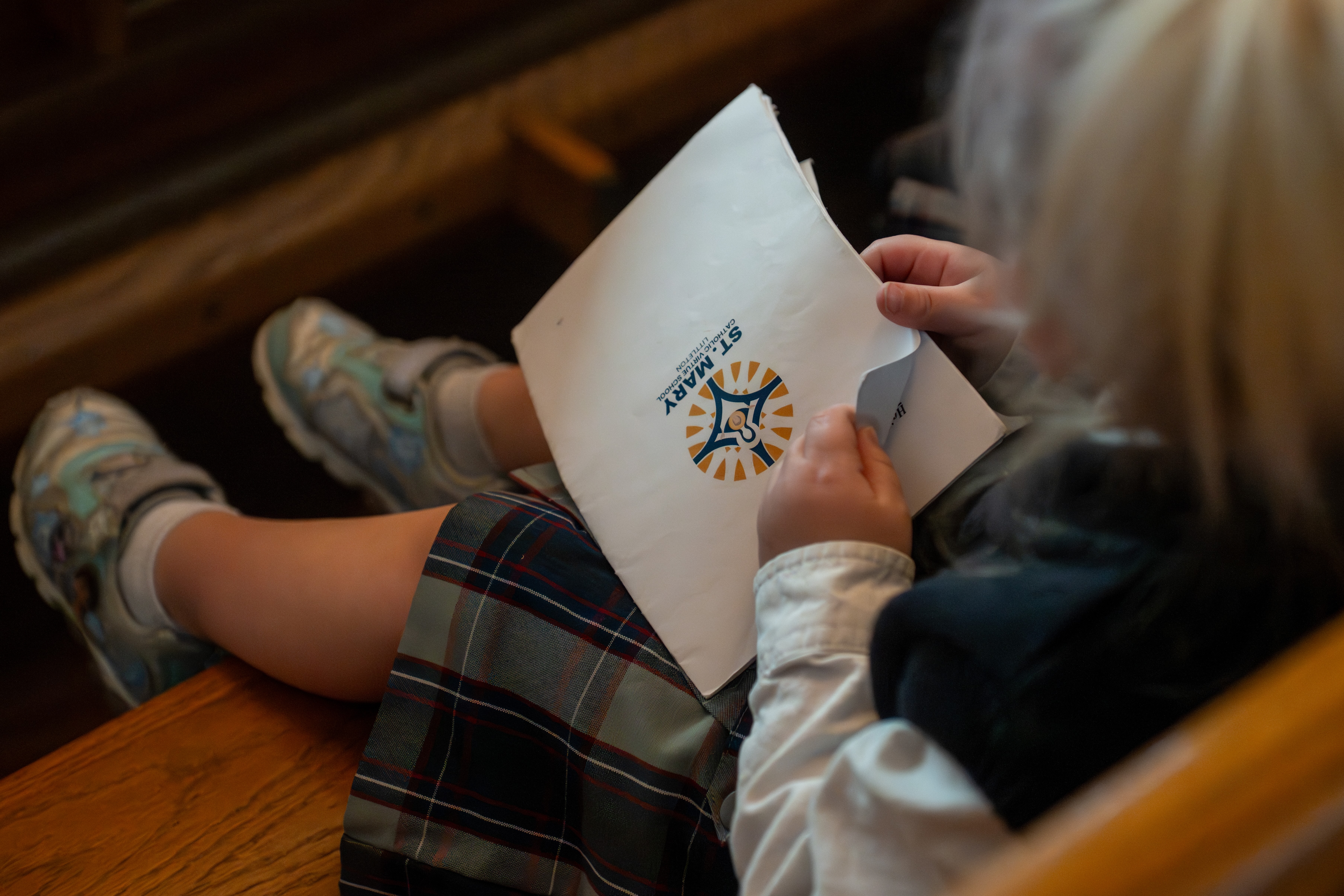 A student attends Mass at St. Mary Catholic Virtue Preschool in Littleton, Colorado. | Credit: Becket