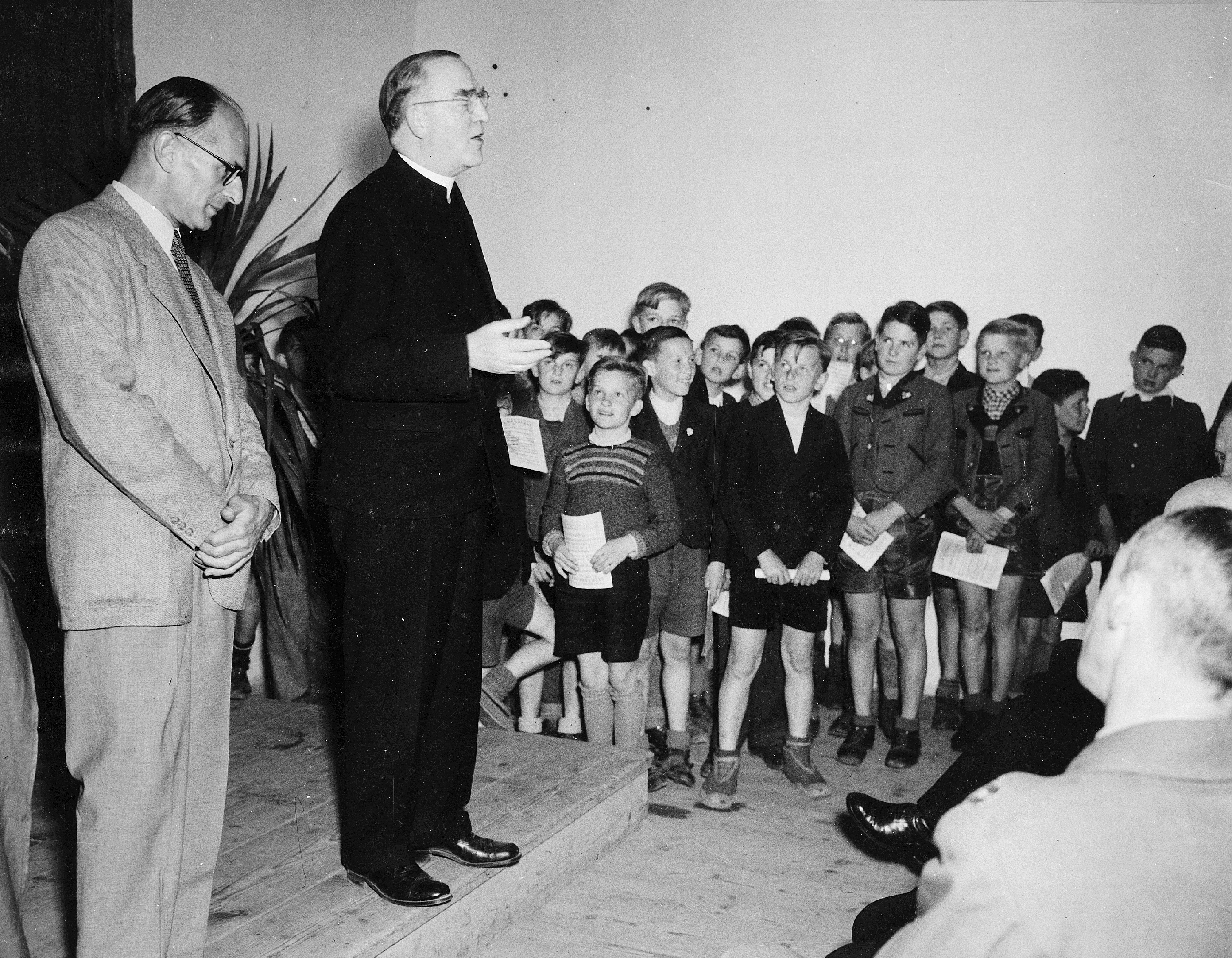 Father Edward J. Flanagan speaks to boys at a youth center in Austria. Photo courtesy of Boys Town.