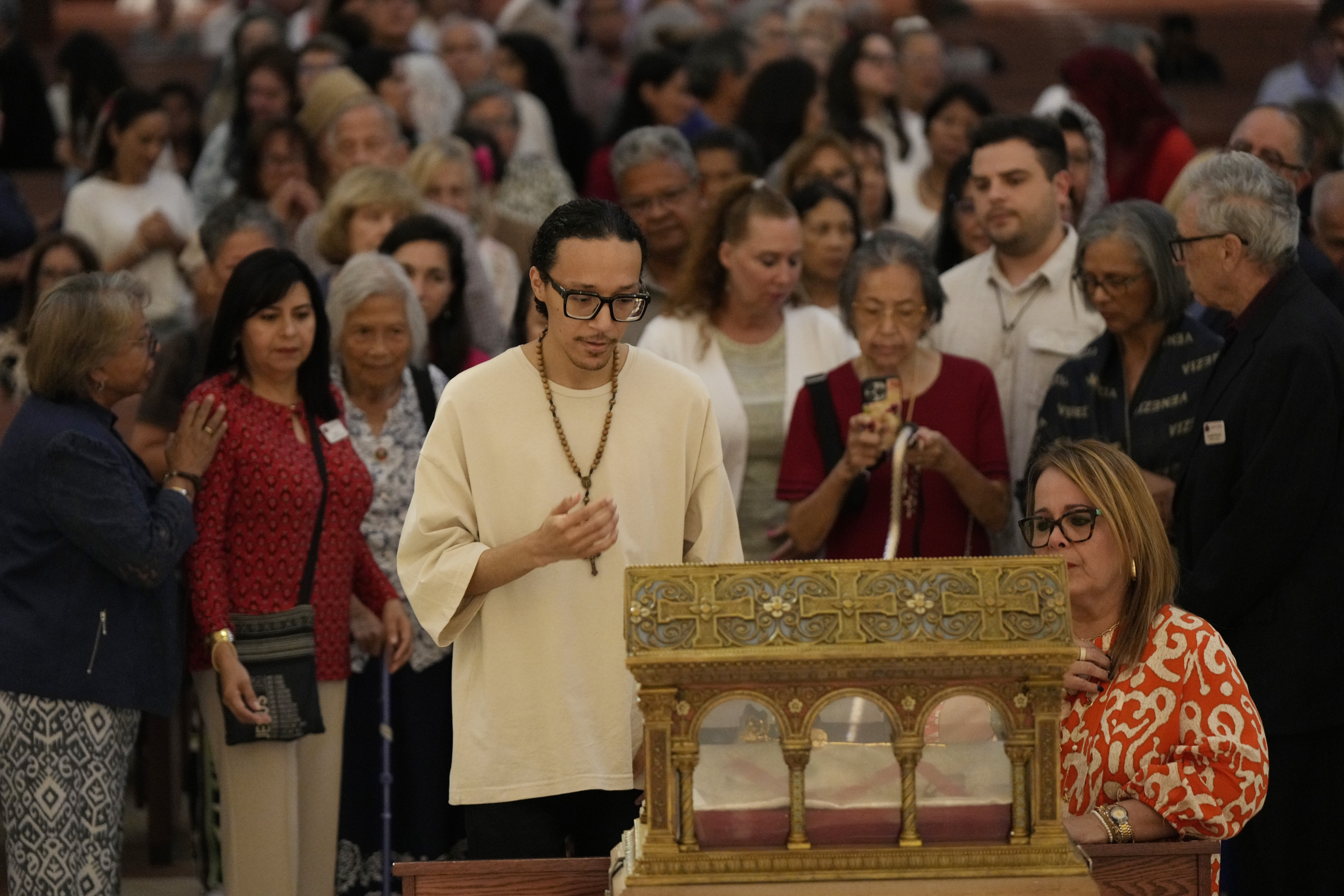 People venerate the major relics of St. Margaret Mary Alacoque at St. James Cathedral in Orlando, Florida, on June 12, 2026. The Knights of Columbus brought the relics of Alacoque, a French nun and mystic who promoted devotion to the Sacred Heart, to the United States for a multicity tour. | Credit: Photo courtesy of Paul Haring/Knights of Columbus