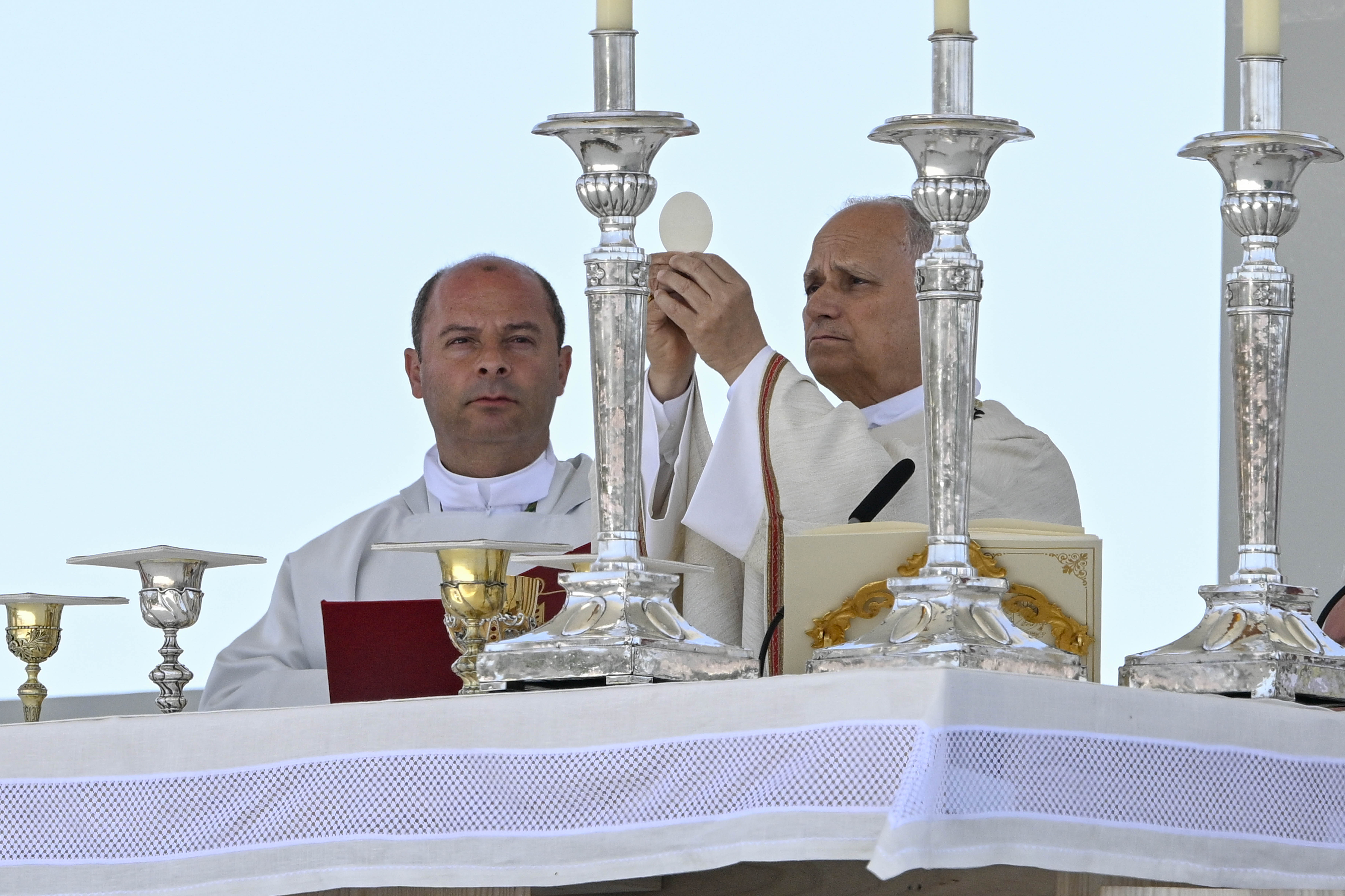 Pope Leo XIV elevates the Eucharist during Mass at the Port of Santa Cruz in Tenerife, June 12, 2026. | Credit: Vatican Media