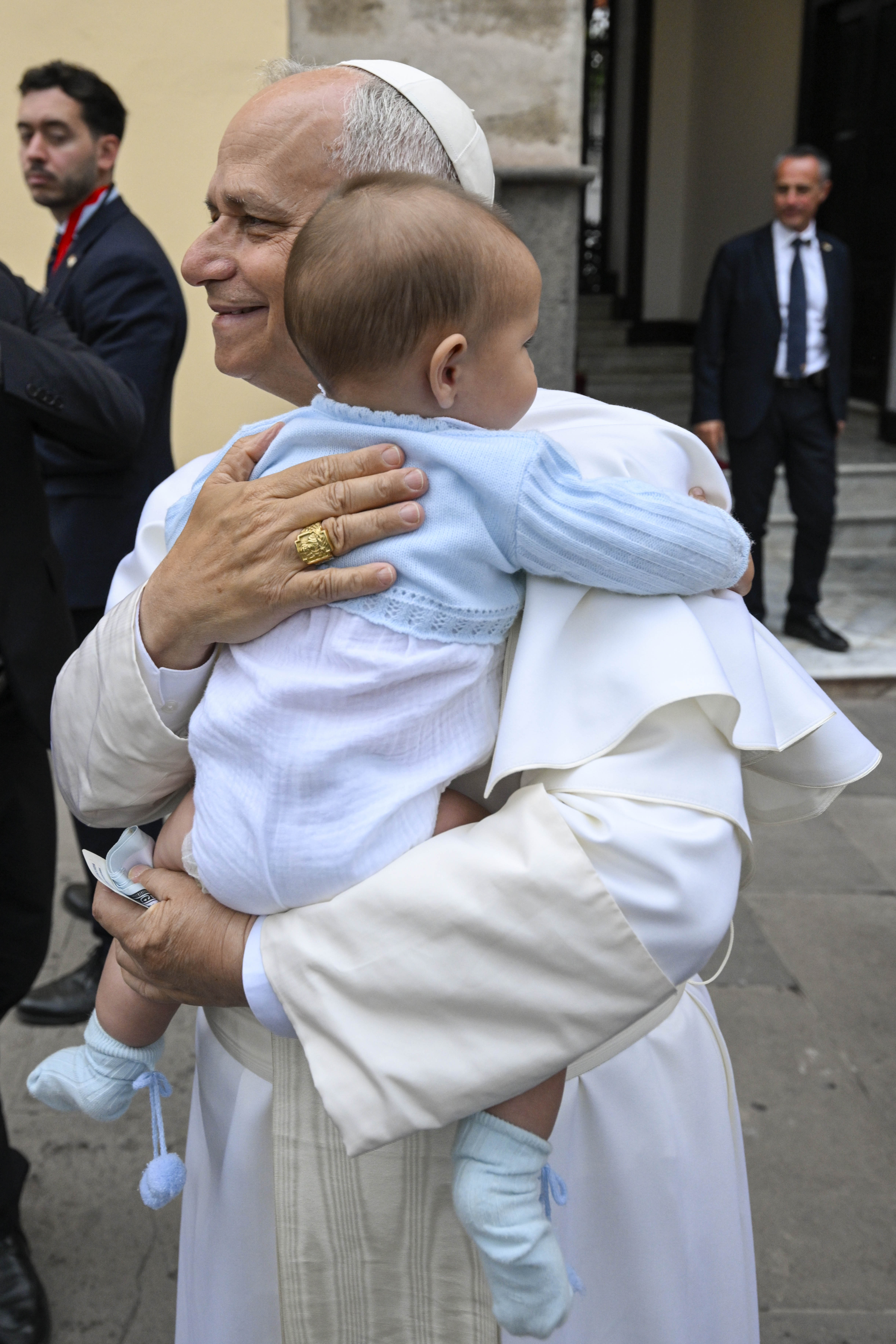 Pope Leo XIV holds a baby in Gran Canaria, June 12, 2026. | Credit: Vatican Media