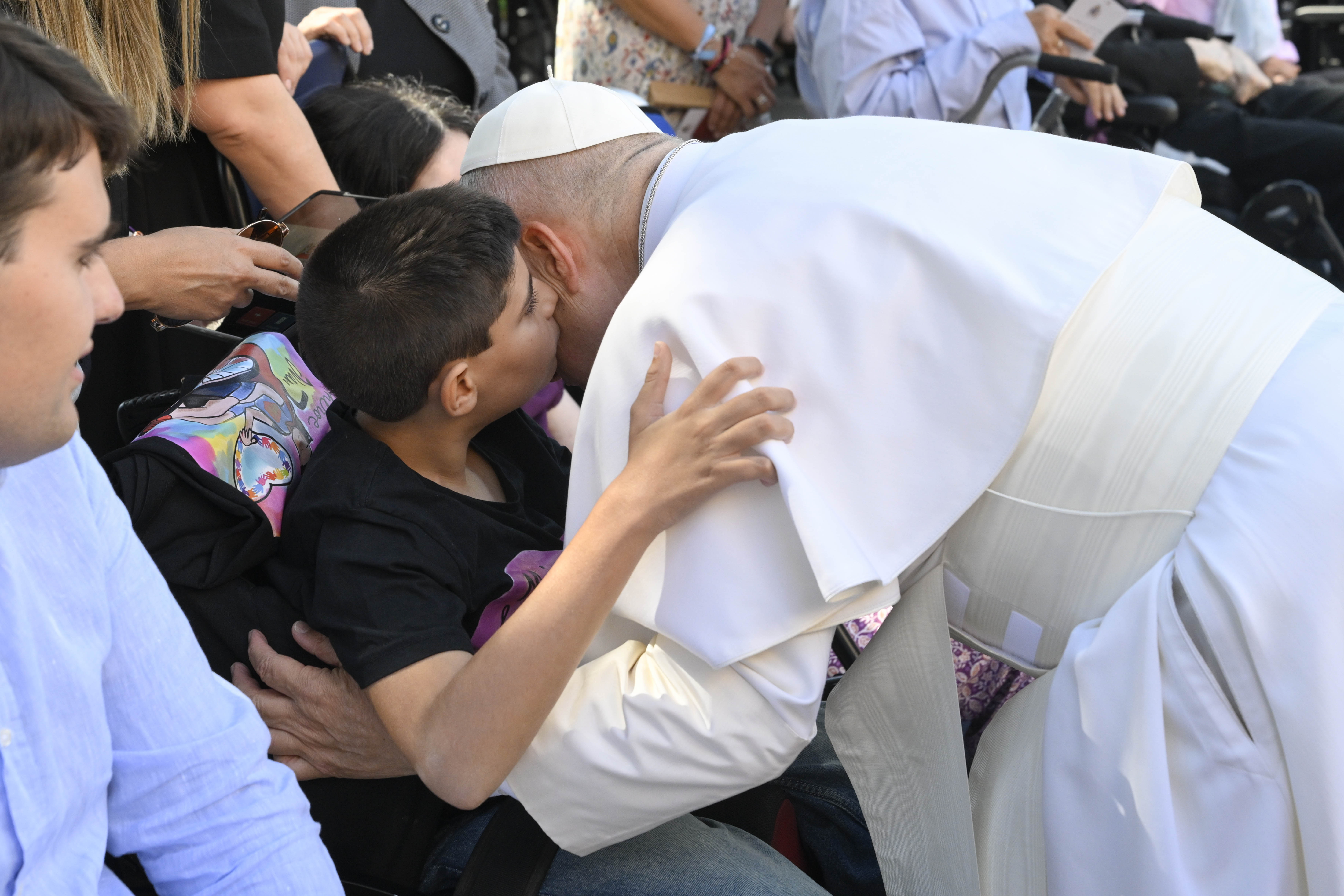 Pope Leo XIV hugs a boy during a meeting with a group of around 40 people with longterm illnesses or disabilities on June 6, 2026, at the nunciature in Madrid, Spain. | Credit: Vatican Media.