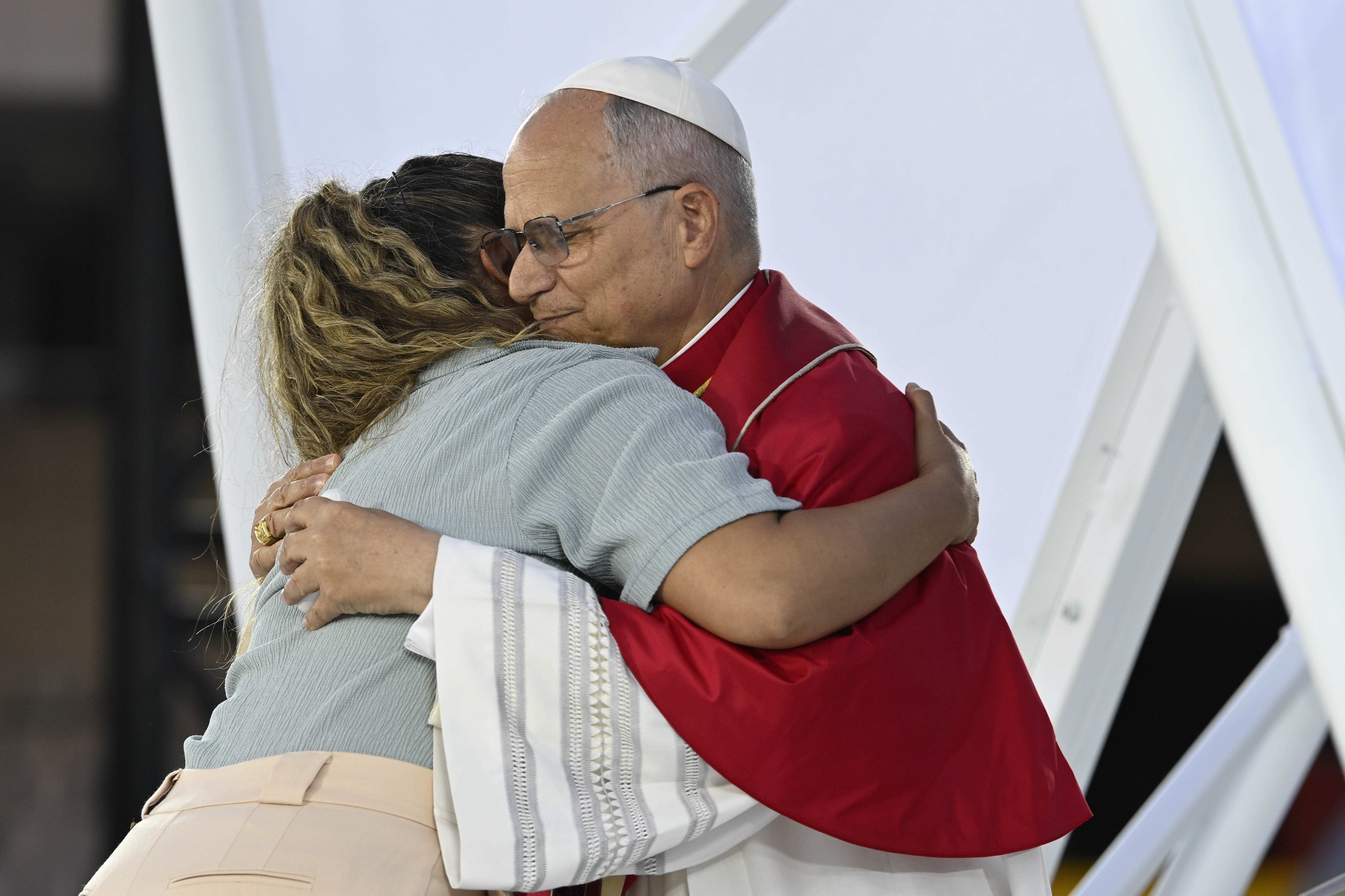 Carmina is shown here being embraced by Pope Leo XIV after talking with him about her experience of surviving depression and suicide. | Credit: Vatican Media