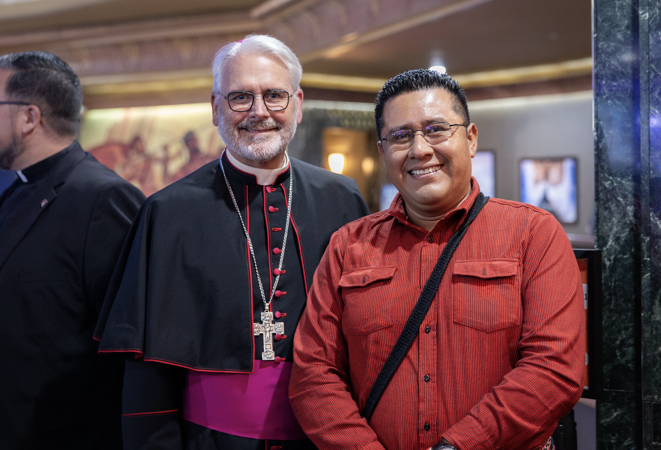 Archbishop Paul Coakley of Oklahoma City, left, and Felipe Coche Pablo, right, at the premiere of “American Martyr: The Stanley Rother Story” on July 28, 2026. | Credit: Photo courtesy of Chris Porter