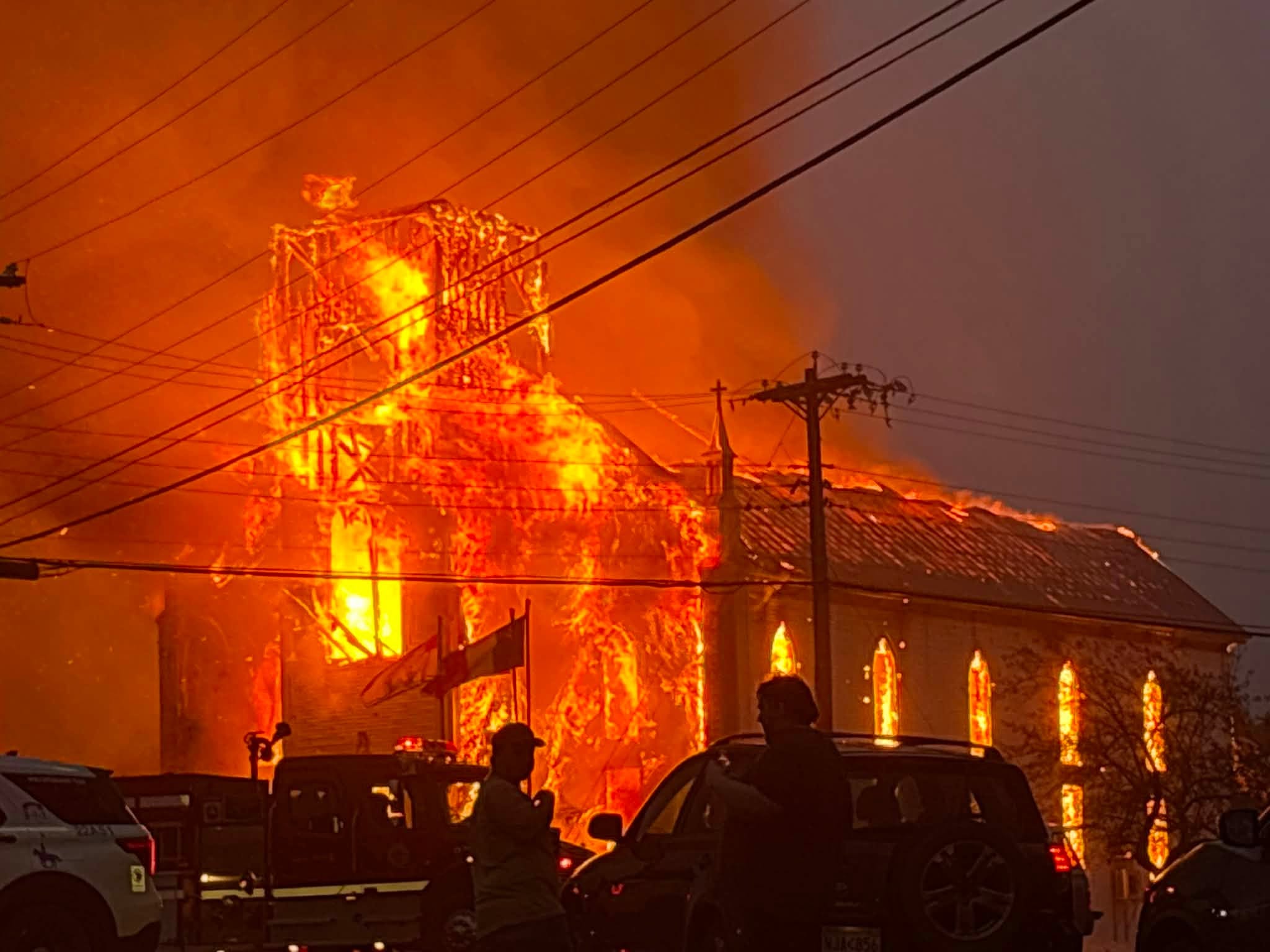 Suspect arrested for arson in burning of historic Catholic church in New Brunswick, Canada