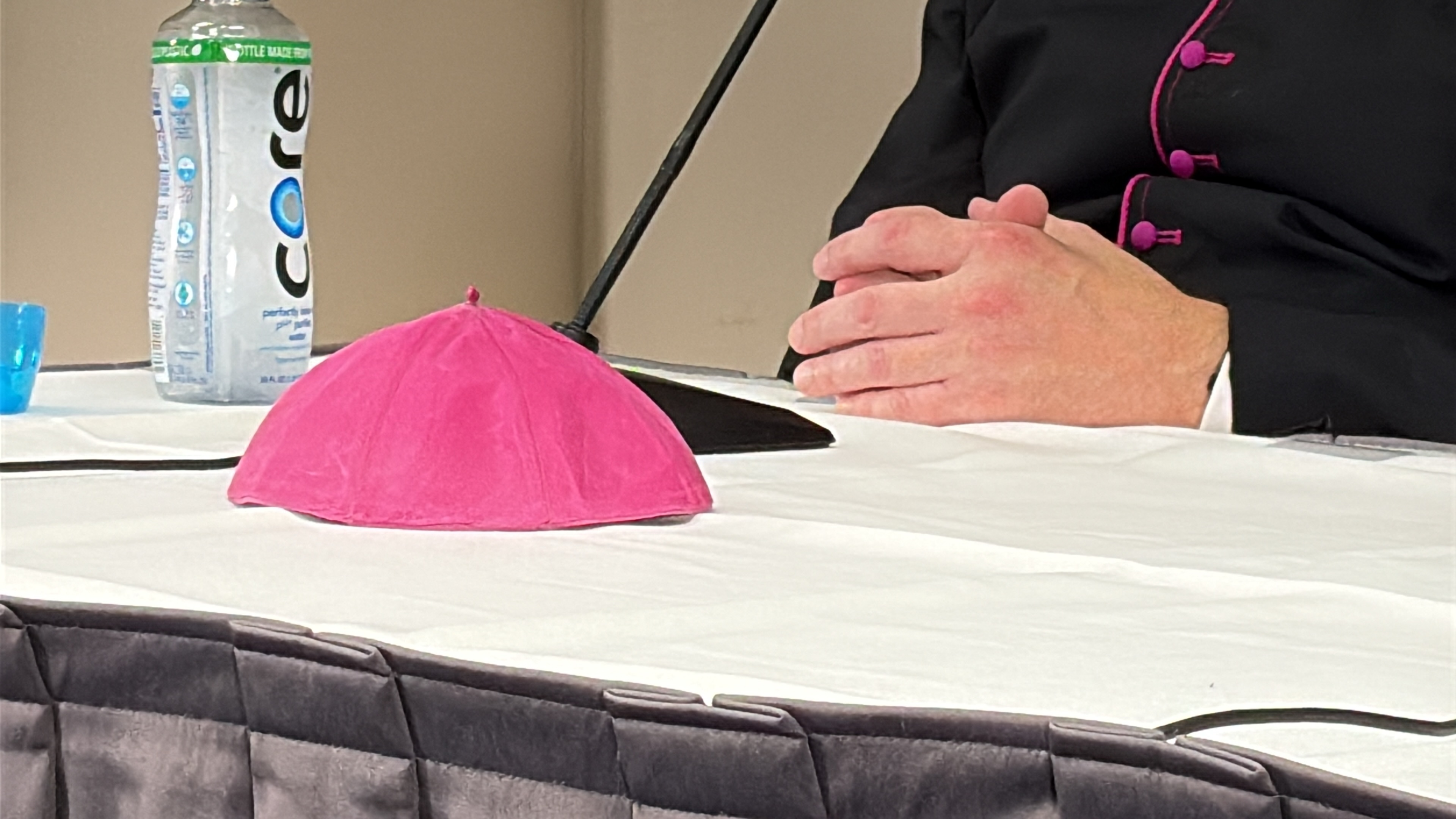 One of Archbishop Fulton Sheen’s zuchettos, the reddish-purple skullcap worn by archbishops, is displayed during a press conference ahead of Sheenʼs beatification on Sept. 24, 2026. | Credit: Jonah McKeown/EWTN News