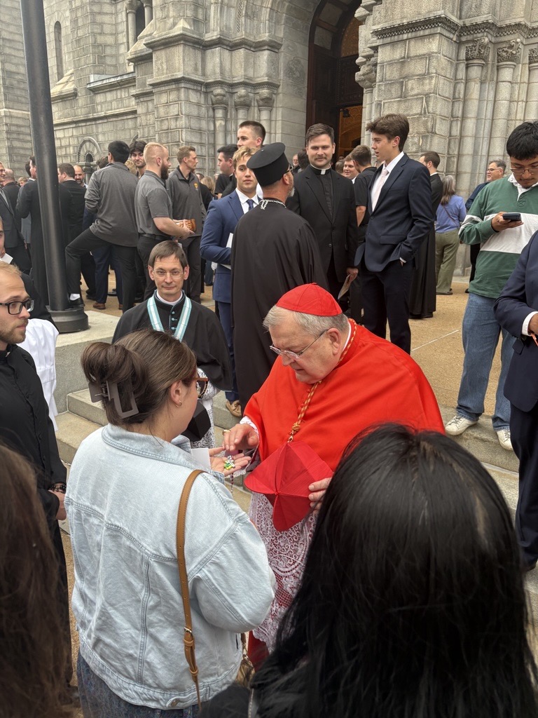 Cardinal Raymond Burke blesses an item outside of the Cathedral Basilica of St. Louis following vespers on Sept. 23, 2026. | Credit: Gigi Duncan/EWTN News