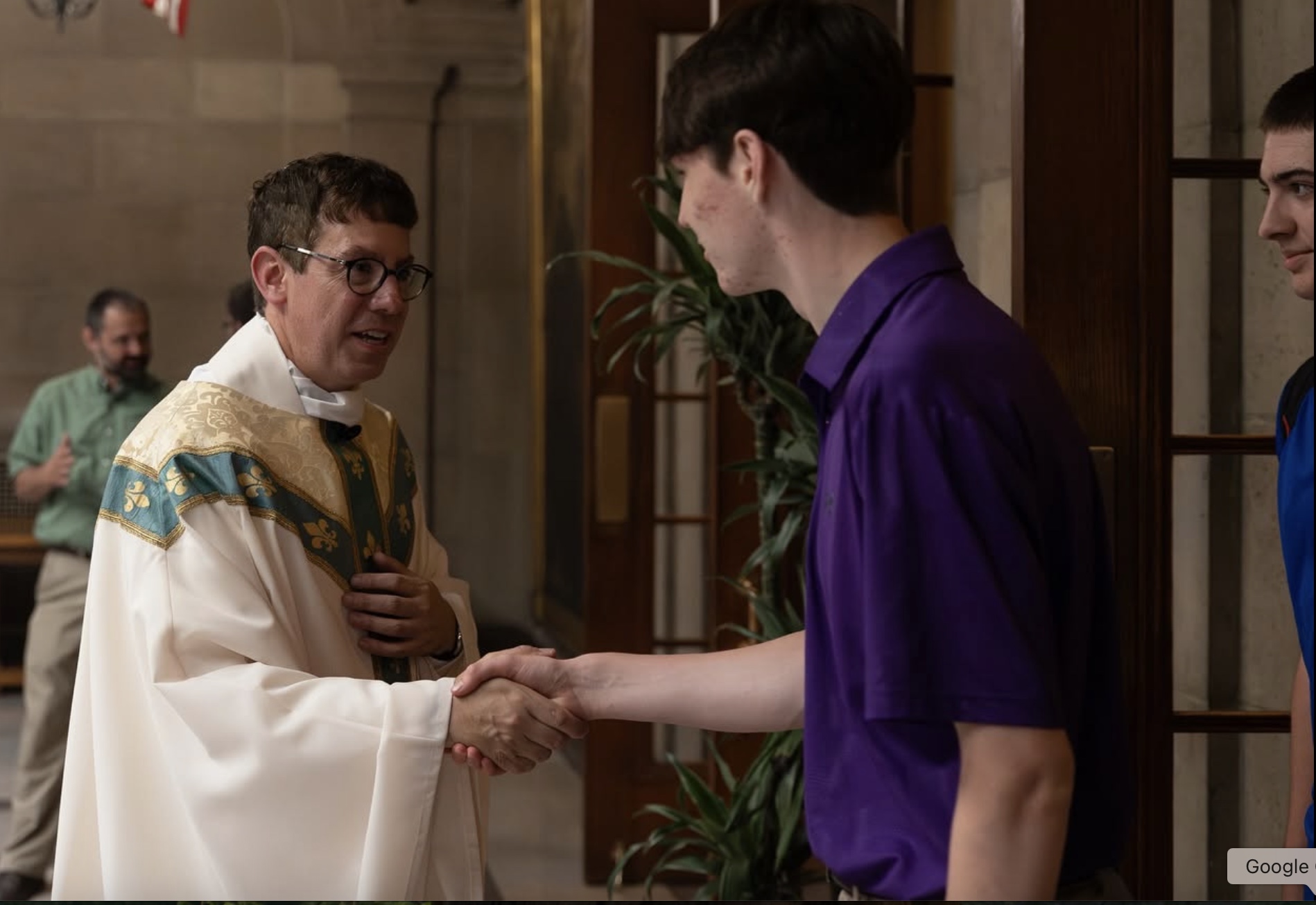Father Stephen Roth, left, vocations director for the Archdiocese of Baltimore, greets a young man at St. Maryʼs Seminary and University in July 2025. | Credit: Photo courtesy of Archdiocese of Baltimore