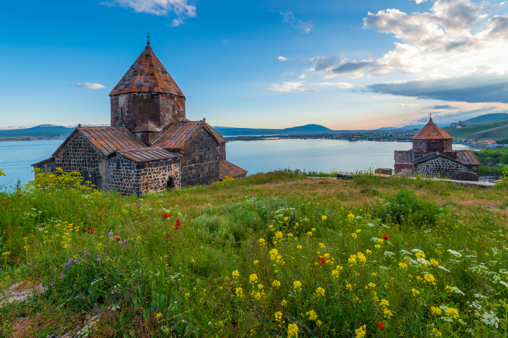 Sevanavank Monastery on Lake Sevan at sunset, Armenia. | Credit: Labunskiy Konstantin/Shutterstock